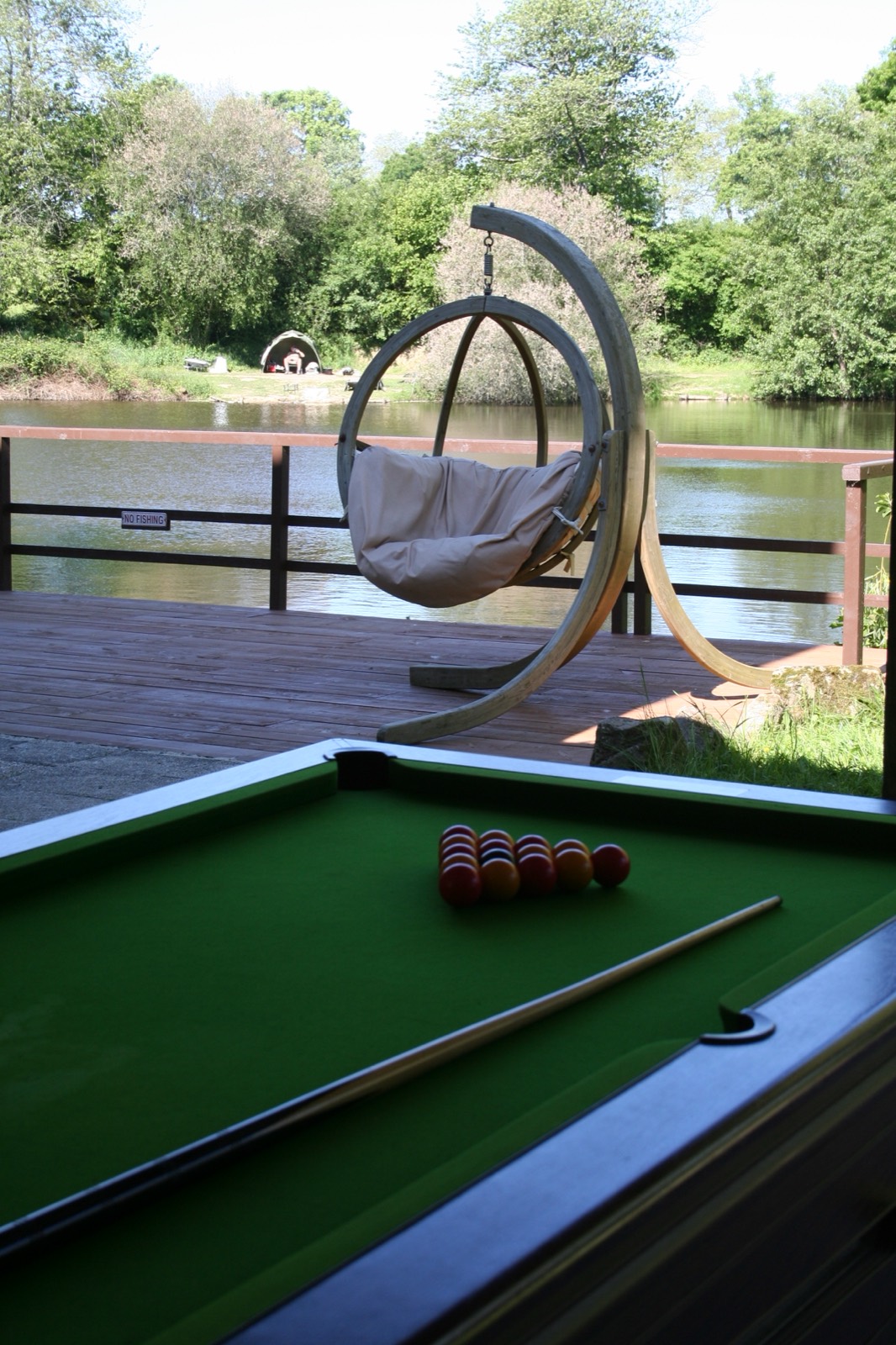 Pool table and social space inside the lodge at The Lodge Lake
